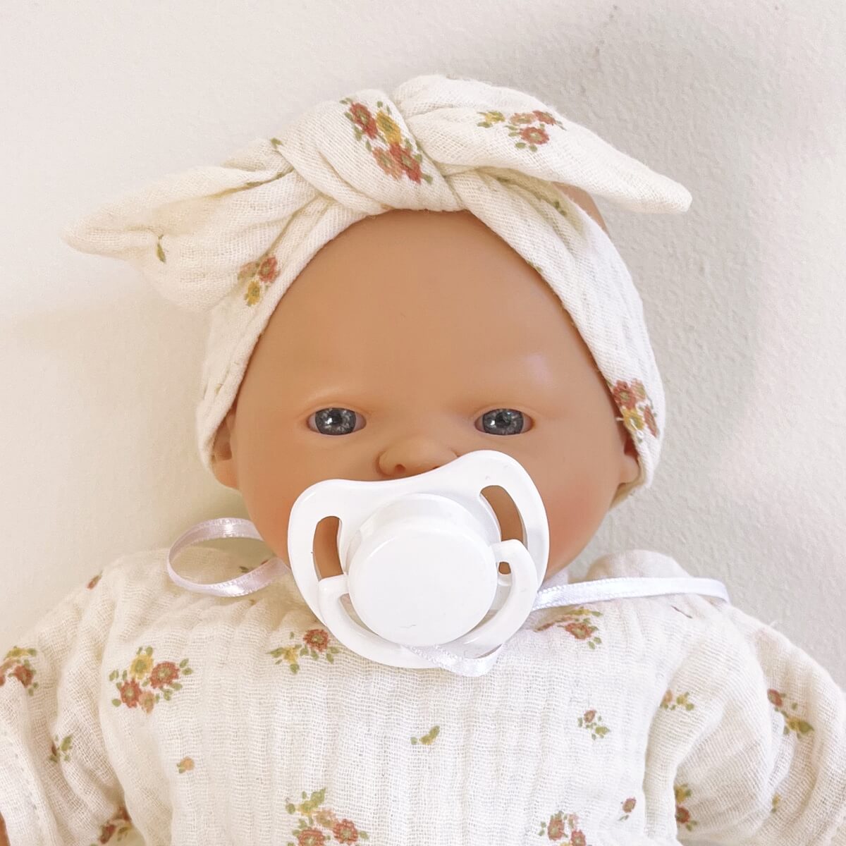 Muñeca Nina 26cm Bobble Flores Rosa_1