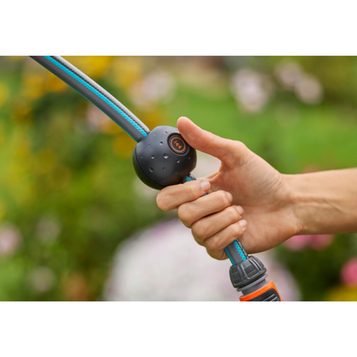 Portamanguera de pared a batería PowerRoll XL 35 m Gardena