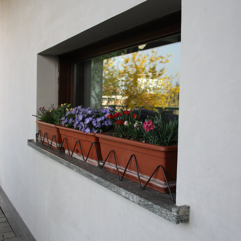 Soporte Anticaida Jardineras Serpentello Blanco.