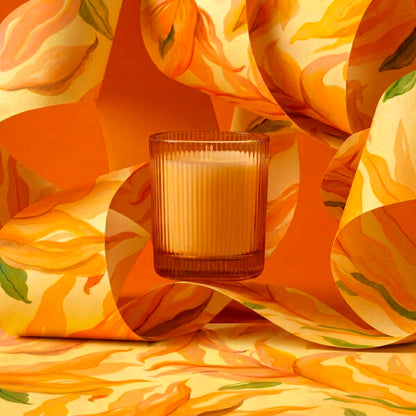 Vela perfumada vainilla y tonka en vaso rayado amarillo 9x8 cm Roura